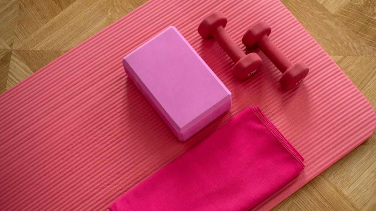 pink exercise mat with weights